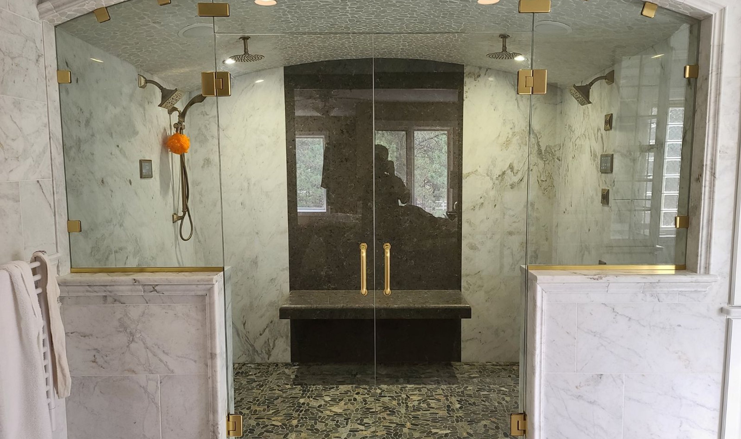 Custom frameless shower enclosure installed by Kent Glass in Colorado Springs