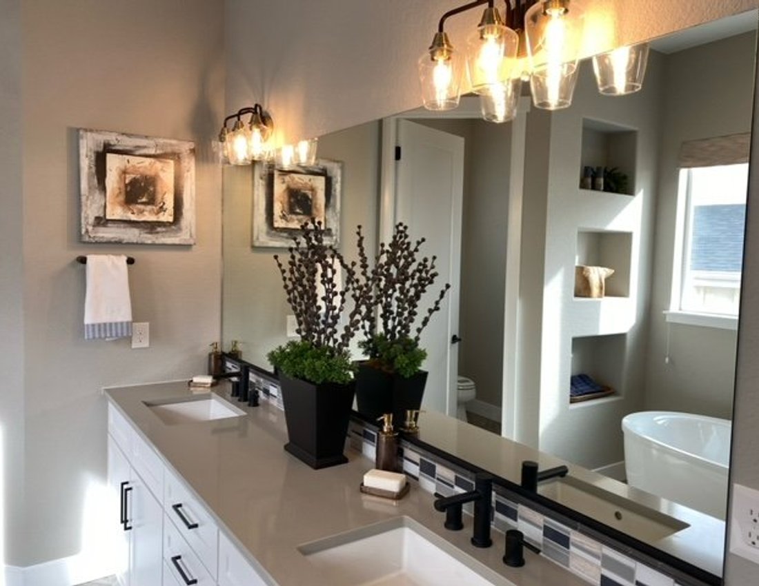 Custom vanity mirror and mirror wall installation by Kent Glass in Colorado Springs